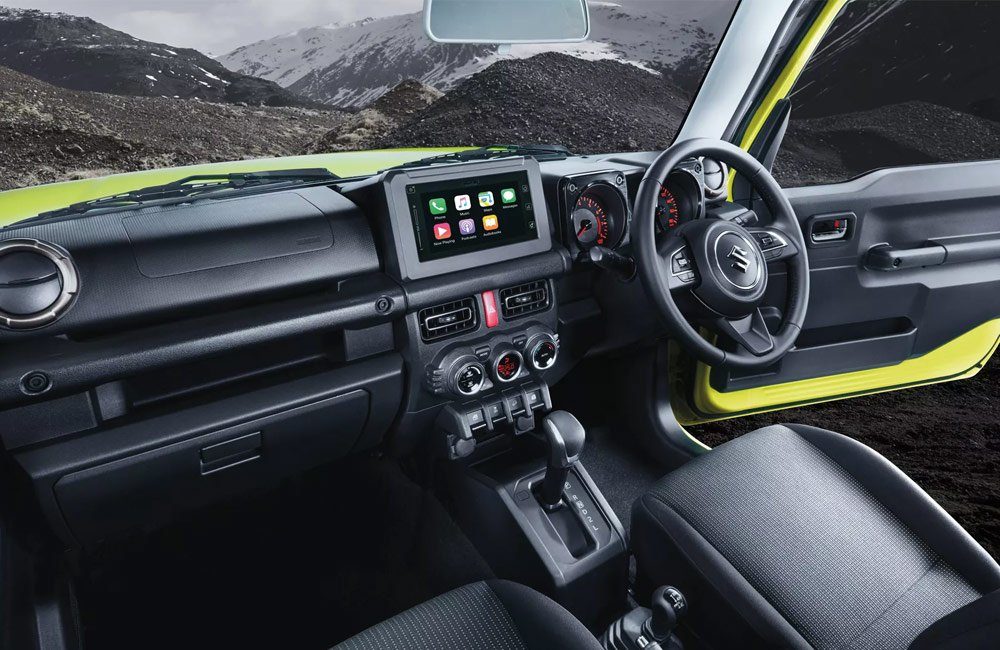 Drivers side interior of a Suzuki Jimny